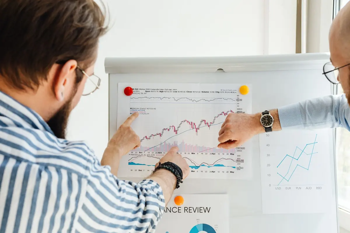 Team reviewing business growth charts in a meeting